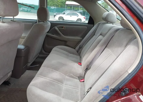 1999 Toyota Camry Le from USA, damaged, VIN 4T1BG22K2XU403782